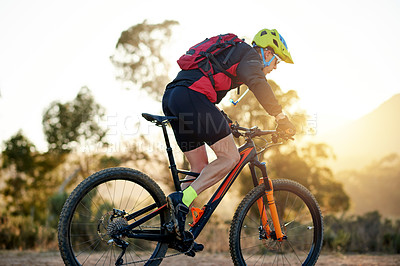 Buy stock photo Cycling, mountain bike and man with training, nature and energy with hobby, adventure and sports. Bicycle, person and cyclist with practice, travel and trail with competition, countryside and journey