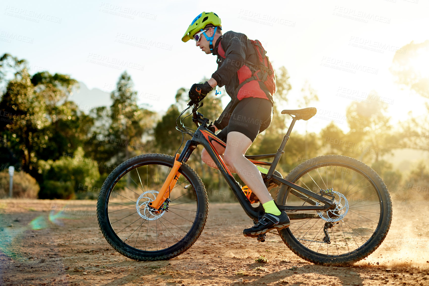 Buy stock photo Mountain bike, cycling and man with sports race, workout or cardio exercise on dirt road. Fitness, triathlon and male athlete cyclist riding on dust trail for competition training with adventure.