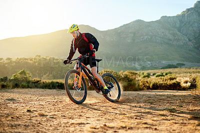 Buy stock photo Mountain bike, training and man with adventure, energy and environment with competition. Person, adrenaline and cyclist with practice, extreme sports or countryside with hobby, journey and nature