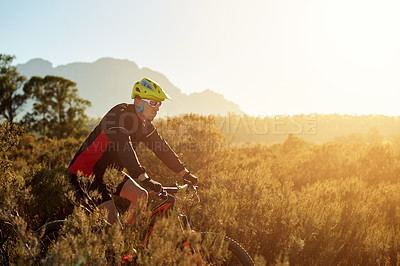 Buy stock photo Helmet, mountain and off road with cyclist man outdoor for exercise, fitness or hobby. Bike, sunglasses and trail riding with person cycling in nature for challenge, performance or sports training