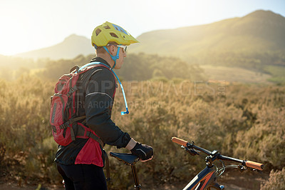 Buy stock photo Cycling, man and mountain bike in countryside for fitness, body health and planning journey for exercise. Nature, rider and bicycle for sports, off road adventure and thinking of workout with view
