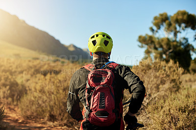Buy stock photo Man, bicycle and athlete walking in forest, outdoor fitness and exercise break by landscape. Male person, back and travel to countryside for off road challenge, cardio rest and dirt practice on path