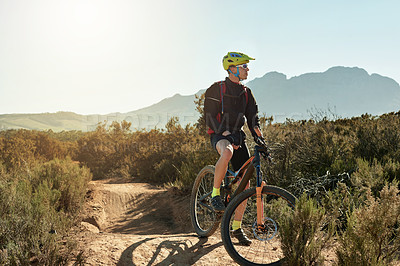 Buy stock photo Bike, break and thinking with man in mountains for outdoor adrenaline, adventure or training. Exercise, fitness and hobby with sports person in nature for challenge, competition or performance