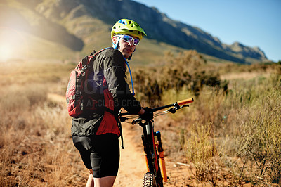 Buy stock photo Cycling, sunglasses and man with mountain bike outdoor for workout, health and exercise with helmet. Countryside, rider and walking with bicycle for sports, off road adventure and travel for fitness
