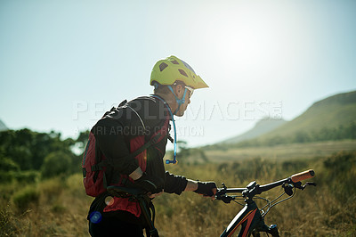 Buy stock photo Cyclist, nature and man with bicycle, travel and athlete with fitness for journey, trail and healthy. Outdoor, race and person with eco friendly transport, carbon footprint and adventure in woods