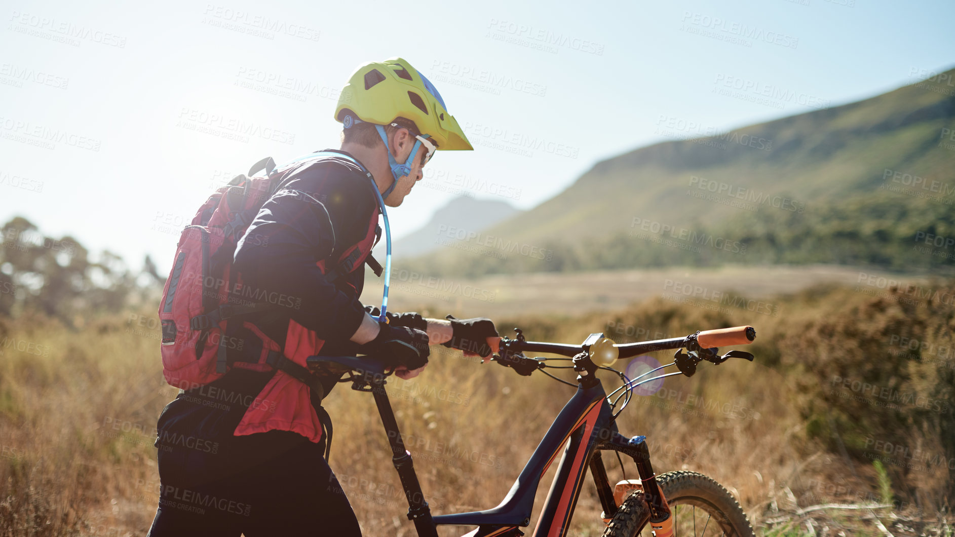 Buy stock photo Cycling, man and push mountain bike outdoor for workout, health and exercise for wellness on journey. Nature, rider and walking with bicycle for sports, off road adventure and travel for fitness