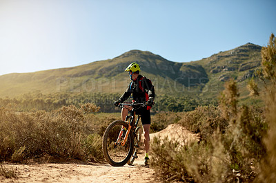 Buy stock photo Cycling, fitness and man riding on dirt road for gravel race, challenge or competition training. Sports, mountain bike and athlete cyclist driving on trail outdoor for exercise or workout in nature.