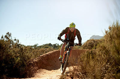 Buy stock photo Mountain bike, adventure and man with fitness, energy and environment with challenge. Healthy person, extreme sports and cyclist with practice, travel or dirt road with hobby, wellness or competition