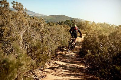 Buy stock photo Back, man and bicycle on mountain for fitness, challenge and sport on dirt path. Athlete, bike and cycling on nature trail for exercise, cardio training or travel in environment for outdoor adventure