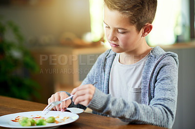 Buy stock photo Upset, child and dislike food at dinner table for eating vegetables and no to nutrition at home. Healthy, brussel sprout and face with disgust, refuse and fussy eater with balanced diet and salad