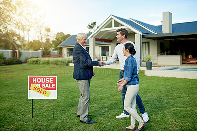 Buy stock photo Smile, realtor and couple with handshake for new home, real estate success and investment offer. People, lease agreement and deal for congratulations of property purchase, negotiation and achievement