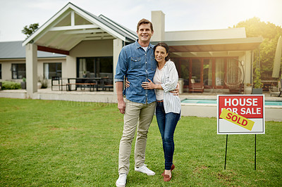 Buy stock photo Real estate, portrait and new home for couple, hug and milestone for homeowner with property and purchase. Outdoor, embrace and people with investment of house, sold sign and success of mortgage