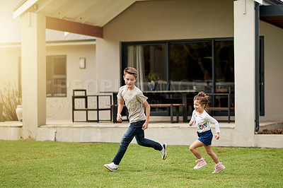 Buy stock photo Kids, running and fun game in backyard with energy, playful chase and race for bonding together. Children, boy and girl with movement for exploring activity, creative adventure and childhood at house