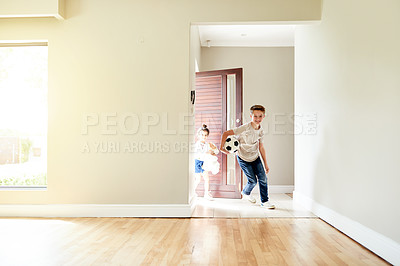 Buy stock photo Excited, kids and running for moving to new home with playful energy, joyful movement and explore property. Happy, children and fun with toys for relocation, discovery games and apartment investment