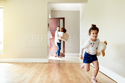 Buy stock photo Excited, child and running for moving to new home with playful energy, joyful movement and explore property. Happy, girl and parents with boxes for relocation, discovery game and apartment investment