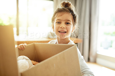 Buy stock photo Portrait, box and happy kid moving to new house, unboxing or pack for property relocation in dream home. Face, real estate or girl child with cardboard for donation, storage or carry toys for charity