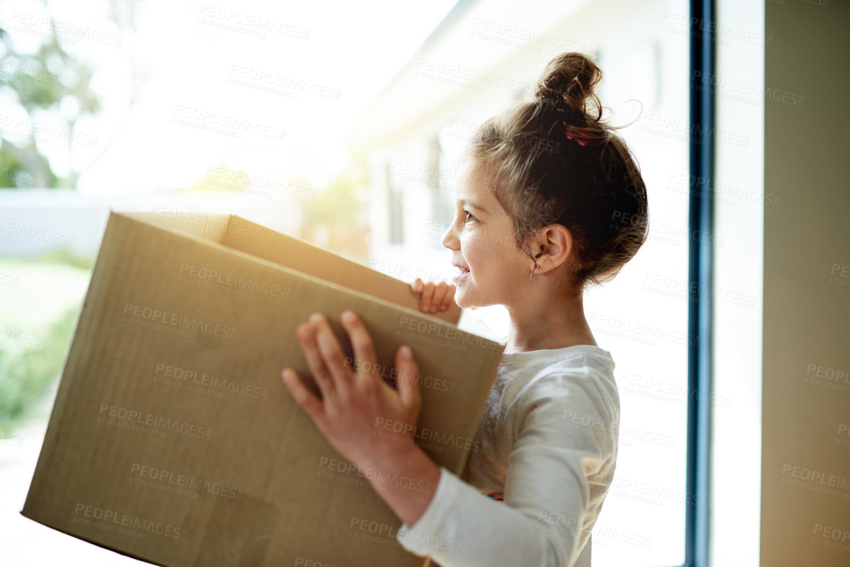 Buy stock photo New home, boxes and girl with smile, profile and excited with rent for property, happiness and moving. Apartment, cardboard and real estate with lens flare, goals and mortgage with investment