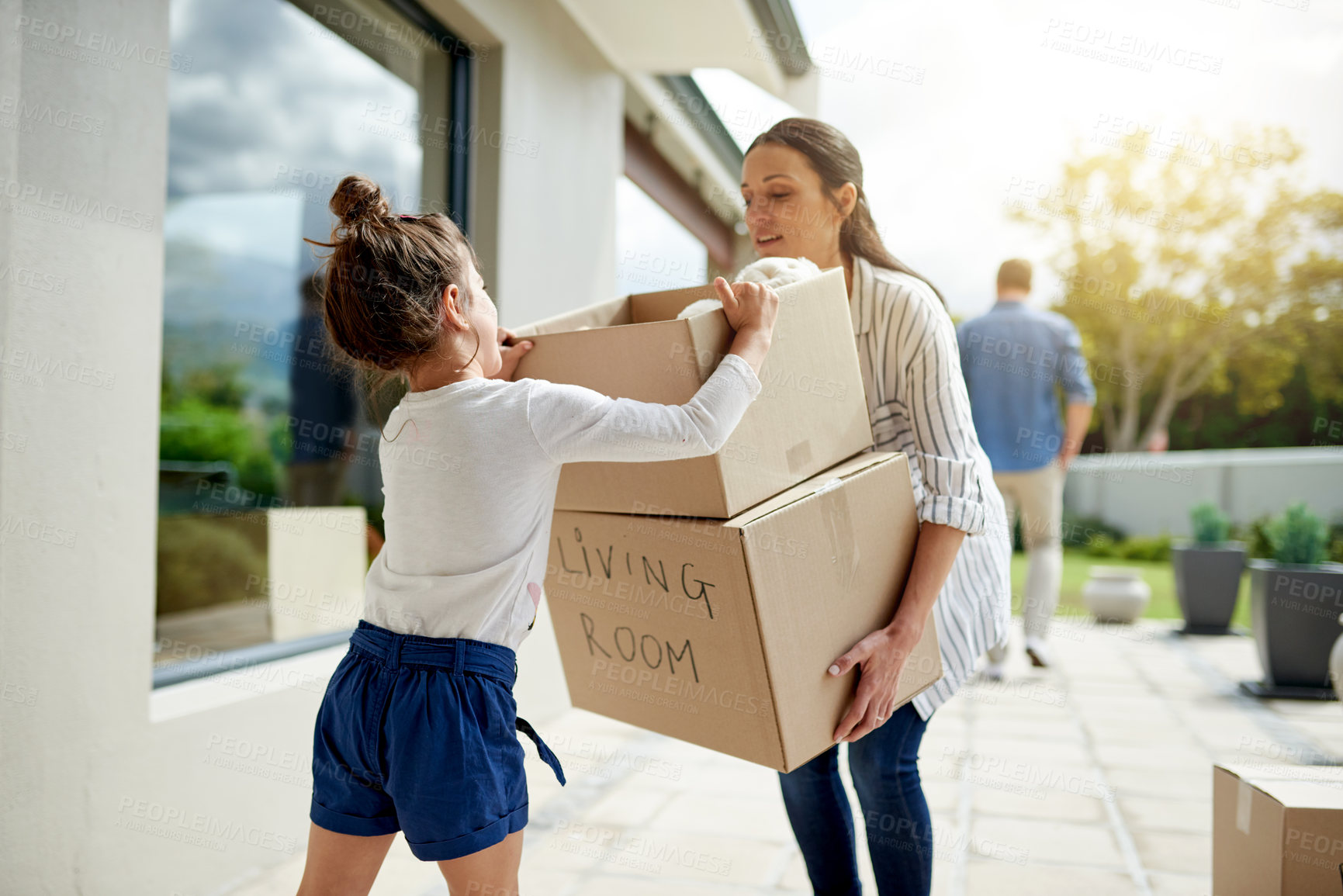 Buy stock photo Mother, girl and helping with boxes at new house for property investment, relocation support and security. Real estate, woman and child with teamwork for moving in, mortgage milestone and fresh start