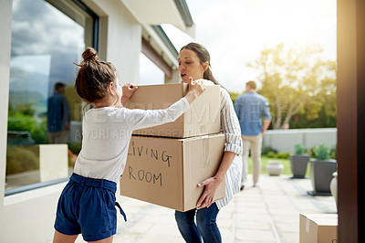 Buy stock photo Mother, kid and helping with boxes at new house for mortgage investment, property relocation and fresh start. Real estate, woman and girl child with teamwork for moving in, home insurance and support