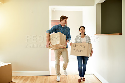 Buy stock photo Beginning, box and couple in living room of new home together for investment, relocation or unpacking. Carry, exited or smile with man and woman walking in apartment for real estate opportunity