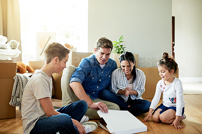 Buy stock photo Family, moving and eating pizza in new home to celebrate real estate investment with parents on floor. Mother, father and kids with fast food for relocation, unpacking break or share meal in property