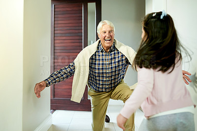 Buy stock photo Love, child and running to grandfather for hug, greeting or family reunion with excited girl for support in home. Happy grandpa, kid and embrace together for welcome, bonding or care with generations