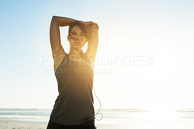 Buy stock photo Beach, earphones and woman stretching for fitness, healthy body and wellness with mockup space. Warm up arms, music and athlete outdoor to prepare for exercise, training and ready for sports workout