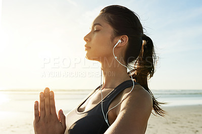 Buy stock photo Girl, earphones or beach meditation for sunset zen, manifestation or mindfulness gratitude. Mudra, namaste or binaural frequency music for mental health, wellness or anxiety relief in nature space