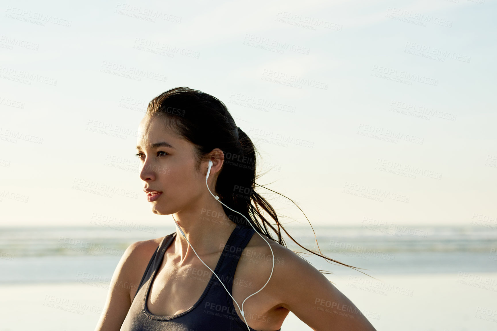 Buy stock photo Exercise, beach and mockup with woman thinking for running, workout and summer goal with music. Athlete, earphones and ready to start jog for fitness, endurance or health for wellness sport training