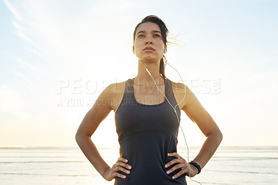 Buy stock photo Workout, beach and thinking with woman prepare for running, exercise and summer with music. Athlete, sunrise or ready to start jog for training, endurance or health for cardio wellness or marathon