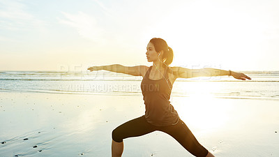 Buy stock photo Person, earphones or beach yoga at sunset for balance, calm or zen mindset in peace mockup space. Warrior pose, music or wellness frequency for awareness, stretching or relax body movement by ocean