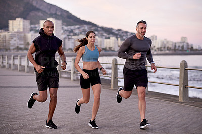 Buy stock photo Fitness, men and woman on promenade for training, wellness and endurance exercise. Athlete, group of friends and running challenge with workout, physical health and resilience for cardio together