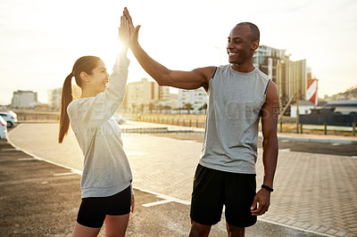 Buy stock photo High five, man and woman in city for fitness, wellness and endurance exercise. Athlete, interracial couple and training  challenge for workout, physical health and resilience or cardio together