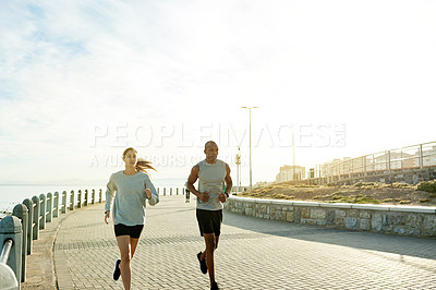 Buy stock photo Outdoor, couple and fitness with running for sports, cardiovascular health and wellness with exercise. Promenade, man and woman with training for marathon challenge, endurance and energy for workout