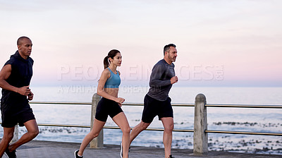 Buy stock photo Running, friends and group on promenade for training, wellness and endurance exercise. Athlete, men and woman with fitness challenge for workout, physical health and resilience or cardio together