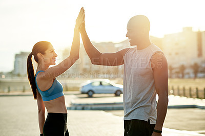 Buy stock photo High five, interracial couple and city sunset for fitness, wellness or workout support. Athlete, man and woman with training goal for exercise, physical health or motivation for cardio together