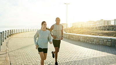 Buy stock photo Outdoor, couple and fitness with running for training, cardiovascular health and wellness with exercise. Promenade, man and woman with sports for marathon challenge, endurance and energy by flare
