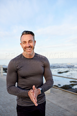 Buy stock photo Mature man, runner and smile on promenade, beach and excited in portrait for fitness, health and morning. Person, exercise and happy by sea, wellness and workout with mock up space in Australia
