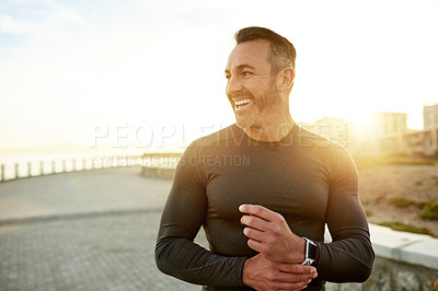 Buy stock photo Runner, fitness and happy man in city in morning for exercise, marathon training or cardio workout. Sports, lens flare and person for wellness, rest and laugh for performance, endurance and running