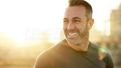 Buy stock photo Happy, running and man in city in morning for exercise, marathon training and cardio workout in town. Sports, sunshine and person for wellness, rest and smile for performance, endurance and fitness