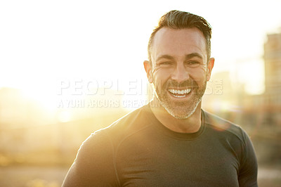 Buy stock photo Laugh, fitness and man in city in morning for exercise, marathon training and cardio workout. Sports, sunshine and happy person for rest, recovery and health for performance, endurance and running