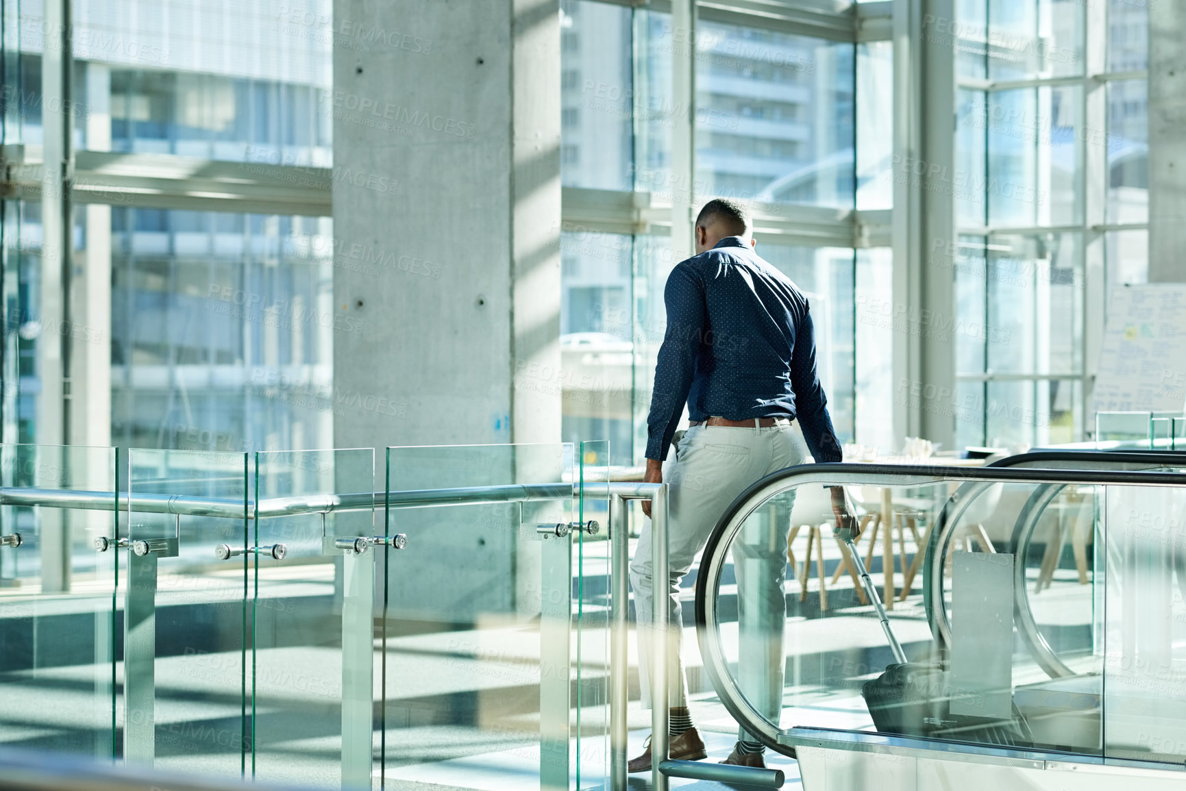 Buy stock photo Man, suitcase and walking in airport for travel, flight schedule and relocation for immigration. Male passenger, business opportunity and luggage bag at terminal with departure for international trip