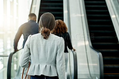 Buy stock photo Business people, escalator and travel of work in office, conference and back of employees for arrival. Colleagues, company start and modern transportation to seminar, commute together and leaving
