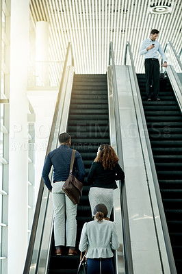 Buy stock photo Business, group or travel on escalator at airport for global conference, flight arrival or international expo. Professional, back of people or bags on moving stairs for corporate journey or departure