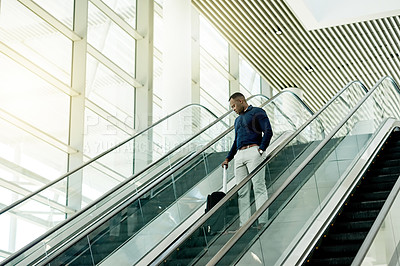 Buy stock photo Escalator, airport and business man with luggage for travel, commute and arrival in lobby. International trip, professional and person on electric stairs for convention, workshop and conference
