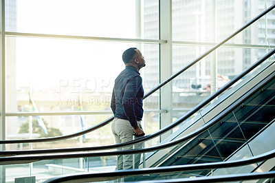 Buy stock photo Escalator, airport and business black man for travel, commute and arrival in lobby for international trip. Morning, professional and person on electric stairs for journey to convention or conference