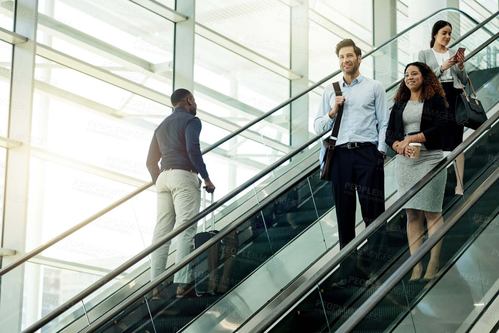 Buy stock photo Business people, escalator and start of work in office, travel and group of employees for arrival. Colleagues, company convention and modern transportation to seminar, commute together and leaving