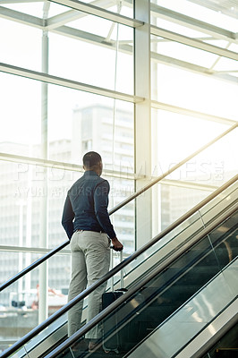 Buy stock photo Thinking, airport and businessman on escalator for travel, commute and arrival in airline lounge. International trip, professional and person on electric stairs for convention, workshop or conference