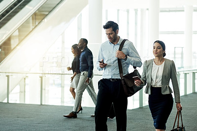 Buy stock photo Business, people and walking with phone at airport for flight schedule, booking information and airplane arrival. Professional, team and travel in lobby for corporate journey and global conference