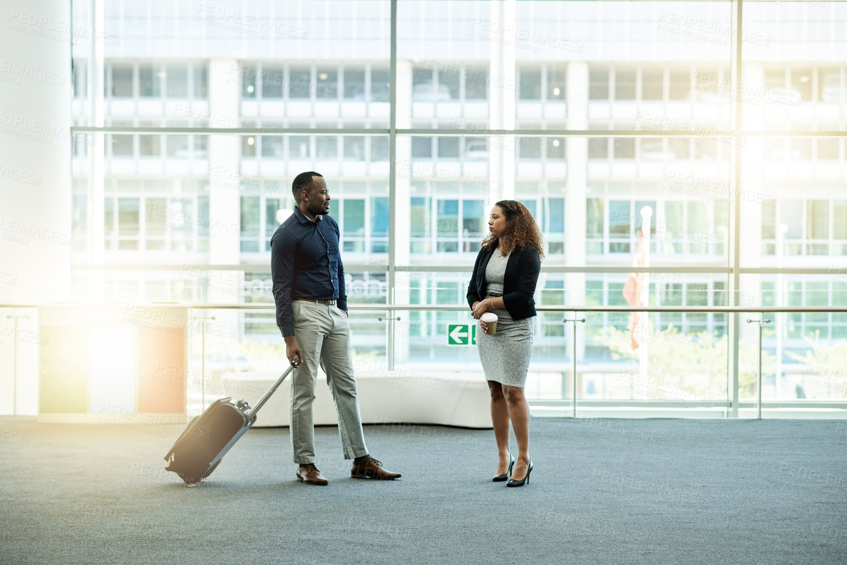Buy stock photo Office, lobby and business people with suitcase meeting for conference, seminar and convention. Modern building, professional workers and man and woman in conversation, discussion and networking